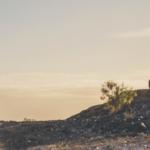 A person Running on a trail in the sunrise